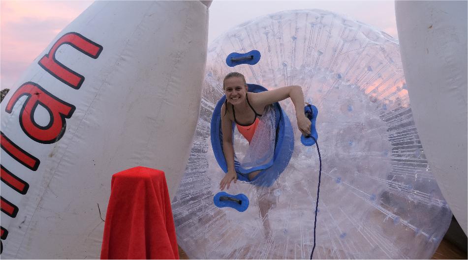 human bowling in a giant zorb ball