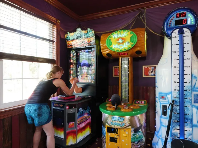 Play whack-a-mole, skeeball, and other carnival midway games in this luxury vacation retreat rental near Orlando
